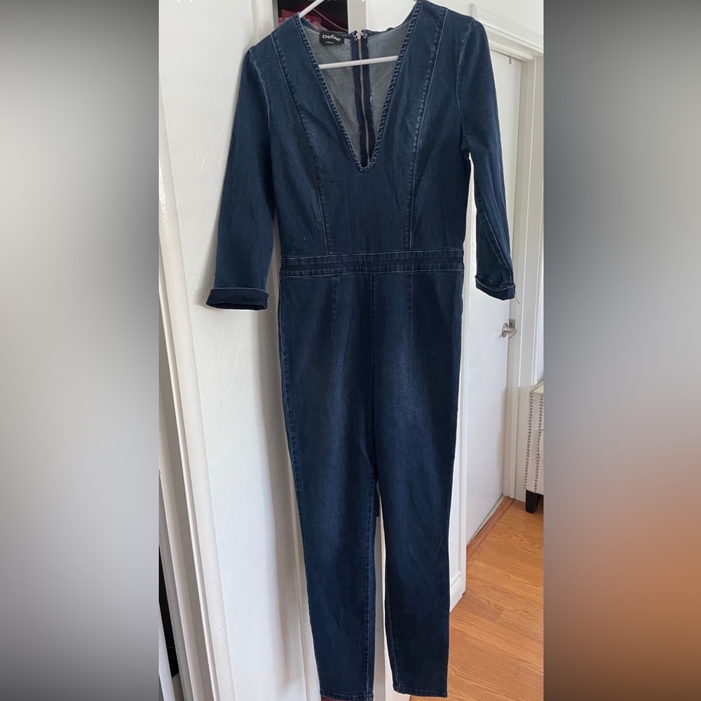 Bebe jeans v-neck long sleeved jumpsuit. Sz 29 fits M in great condition!